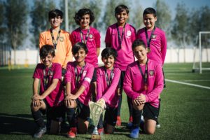 Alliance U12s team winning Dubai's MFC cup