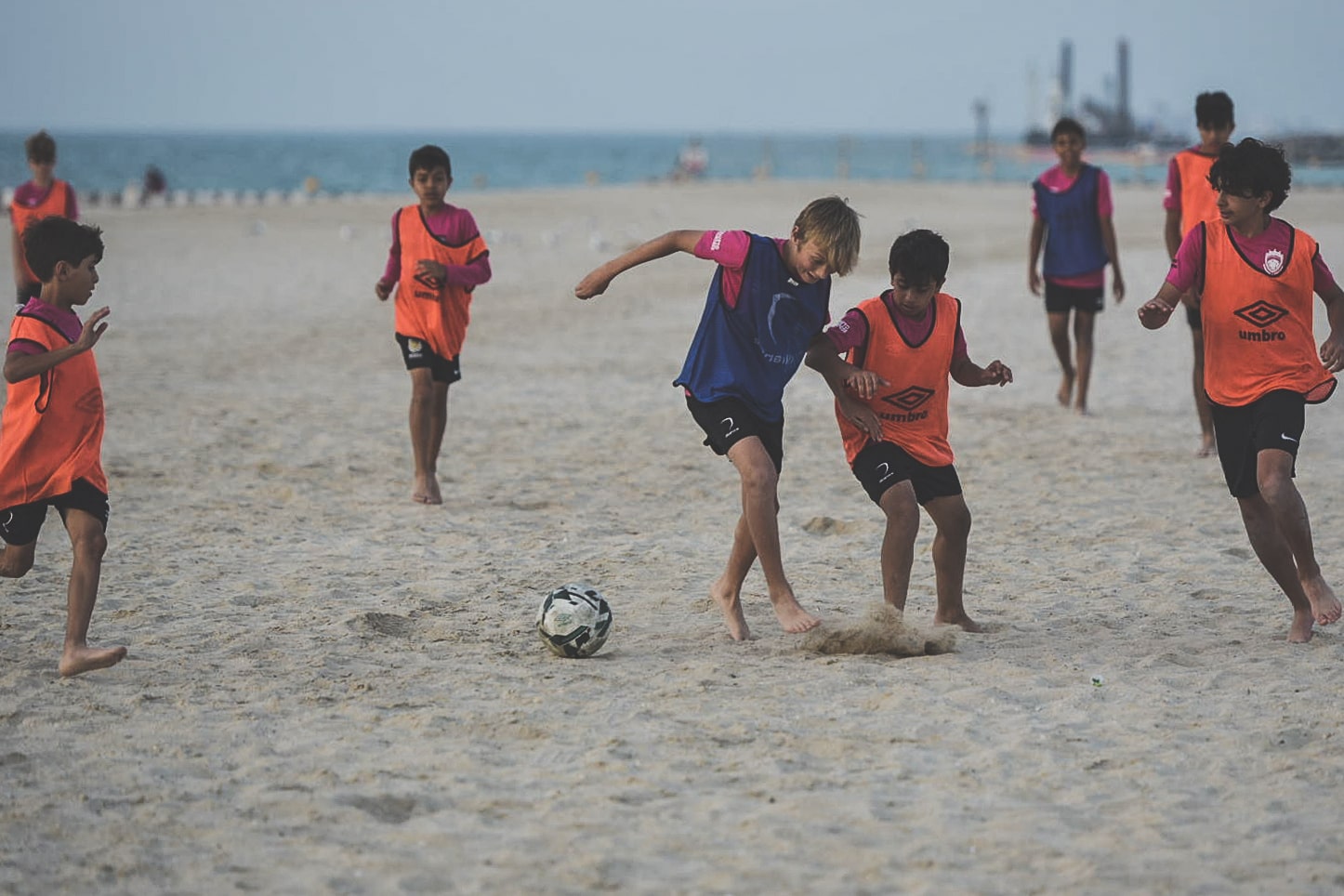 Dubai beach football kids